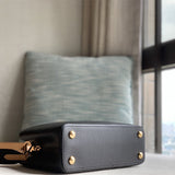  minimalist top-handle bag detail view showing craftsmanship 14