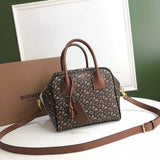 Ziva's Charm handbag – side angle view (one versatile size)