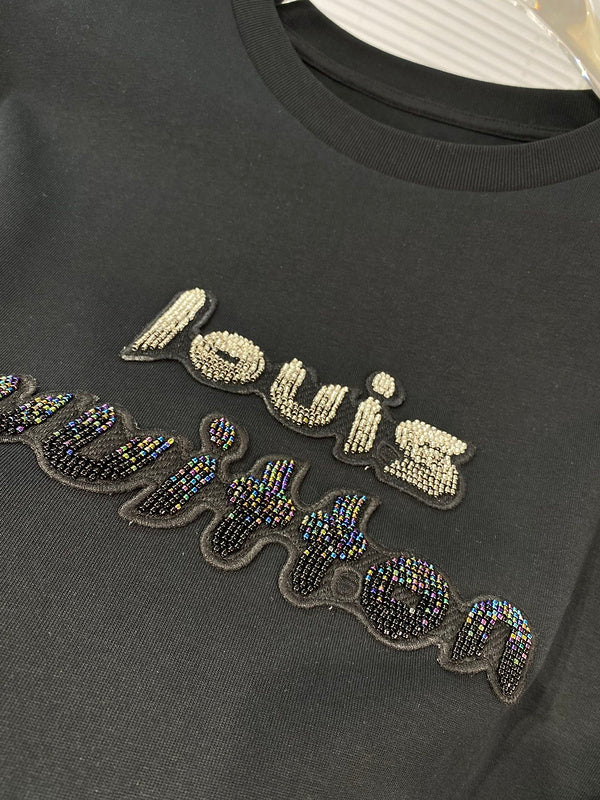 Flat lay presentation of Louis Vuitton cotton t-shirt with streetwear-inspired cut