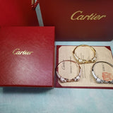 Close-up detail view of Cartier unisex jewelry piece