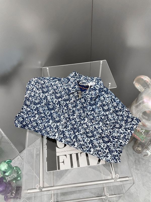 Flat lay presentation of Louis Vuitton luxury clothing with everyday silhouette