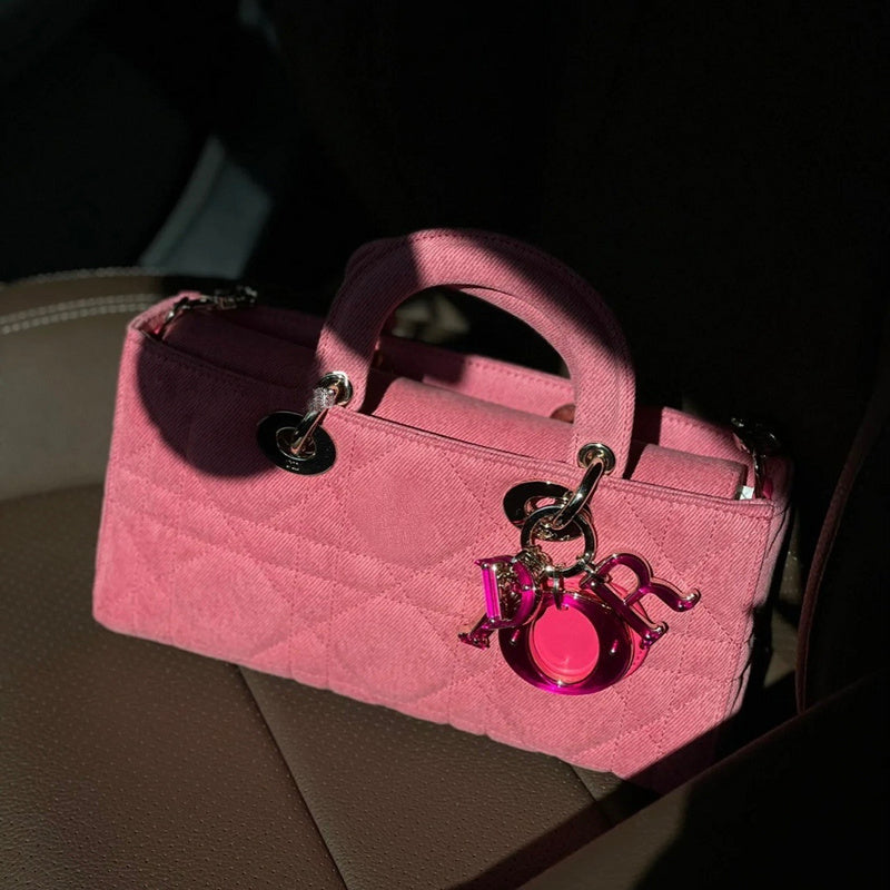 Handle and strap detail of refined elevated women's handbag – women's designer-style accessory
