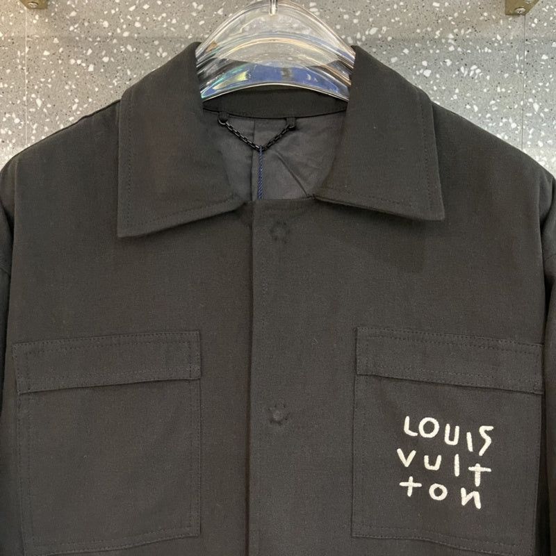 Flat lay presentation of Louis Vuitton luxury clothing with runway-inspired design