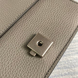 Close-up detail of classic structured women's handbag – women's designer-style accessory