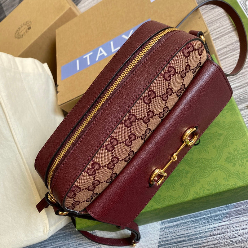 Handle and strap detail of everyday-luxe statement women's handbag – women's luxury handbag