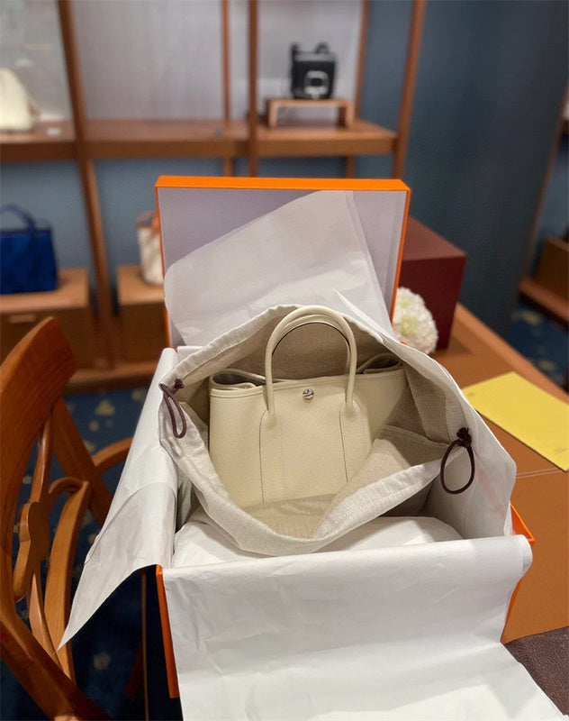 Side view of tailored structured handbag