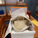 Side view of tailored structured handbag