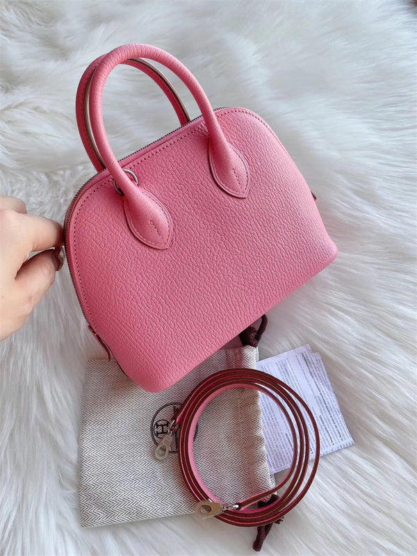 Side view of clean-lined structured handbag