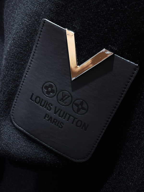 Flat lay presentation of Louis Vuitton luxury clothing with relaxed-fit cut
