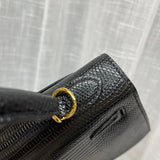 Side view of graceful structured handbag