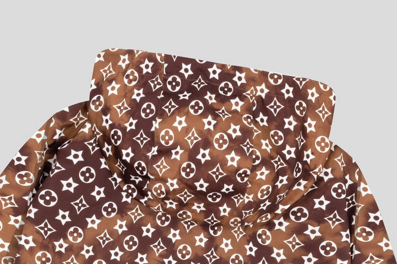 Flat lay presentation of Louis Vuitton luxury clothing with logo-detail design