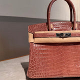 Side view of effortless structured handbag
