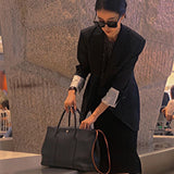  Minimalist shoulder bag front view 13