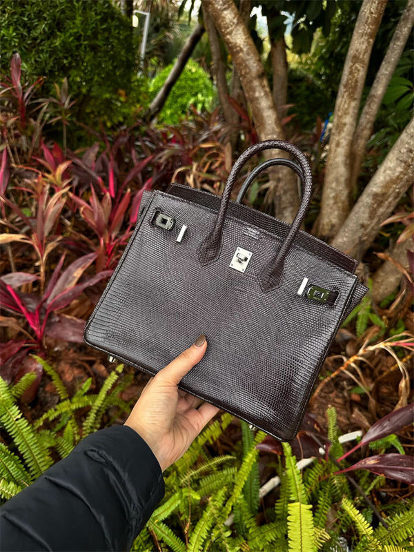 Side view of considered structured handbag