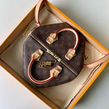 Close-up detail of classic sleek women's handbag – women's statement bag
