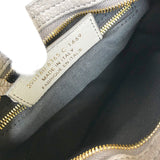 Side profile of polished structured women's handbag – women's designer-style accessory