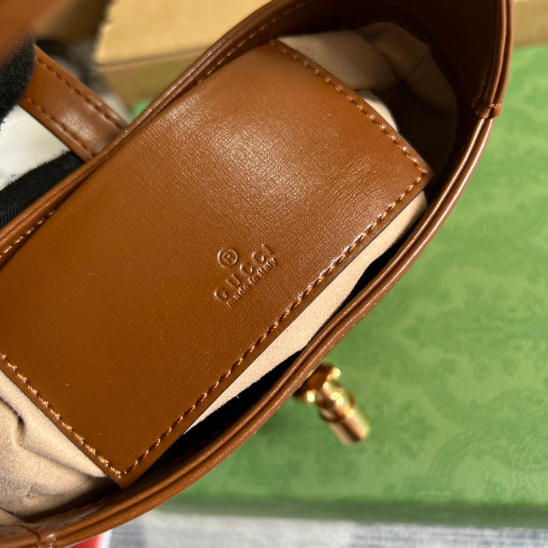 Side profile of statement structured women's handbag – women's premium purse