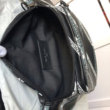 Top view of classic sleek women's handbag – women's luxury accessory