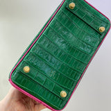 Side view of considered structured handbag