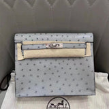Side view of fluid structured handbag