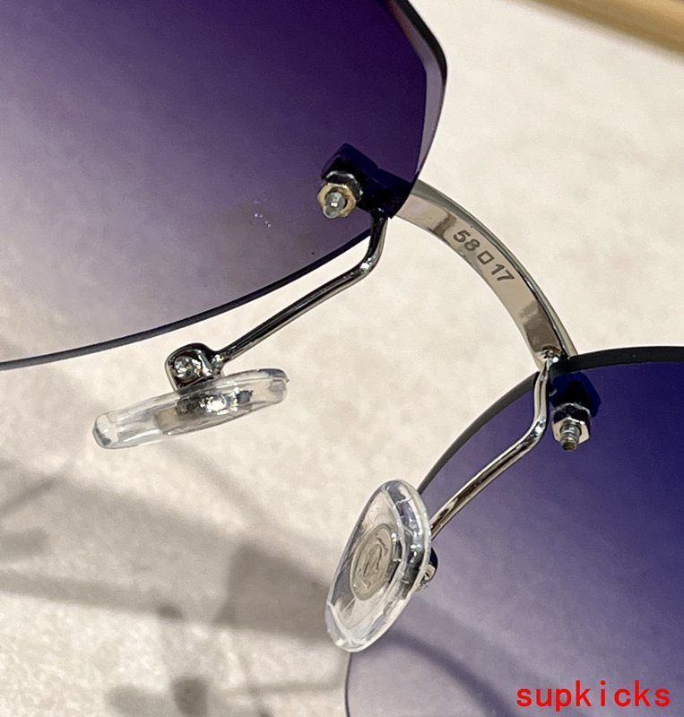 Close-up detail view of Cartier unisex sunglasses