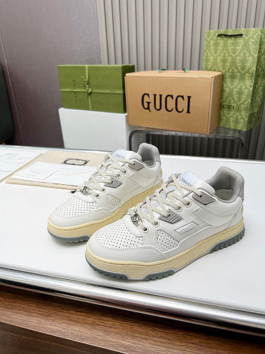 Gucci crisp white luxury sneakers view 11 retro runner design
