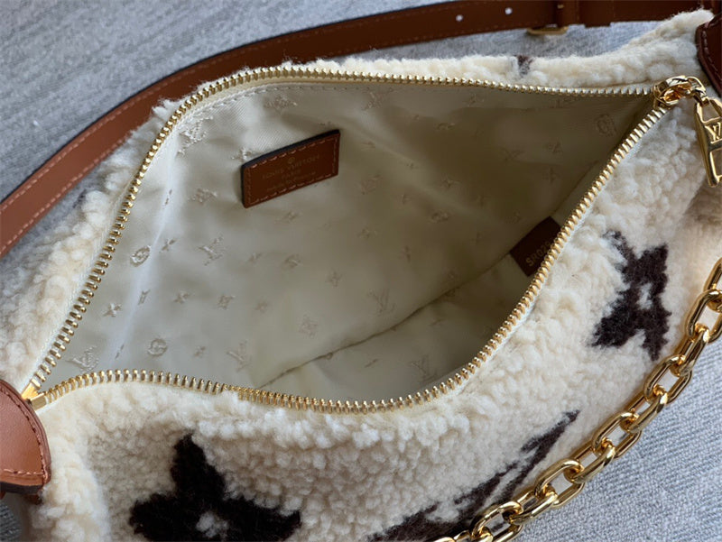  signature shoulder bag styled with outfit
