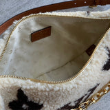  signature shoulder bag styled with outfit