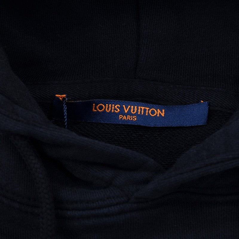 Back view of Louis Vuitton luxury clothing with tailored silhouette