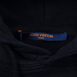 Back view of Louis Vuitton luxury clothing with tailored silhouette