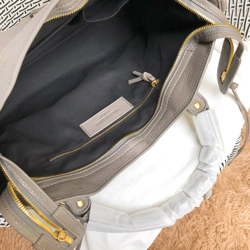 Side profile of structured statement women's handbag – women's designer-style accessory