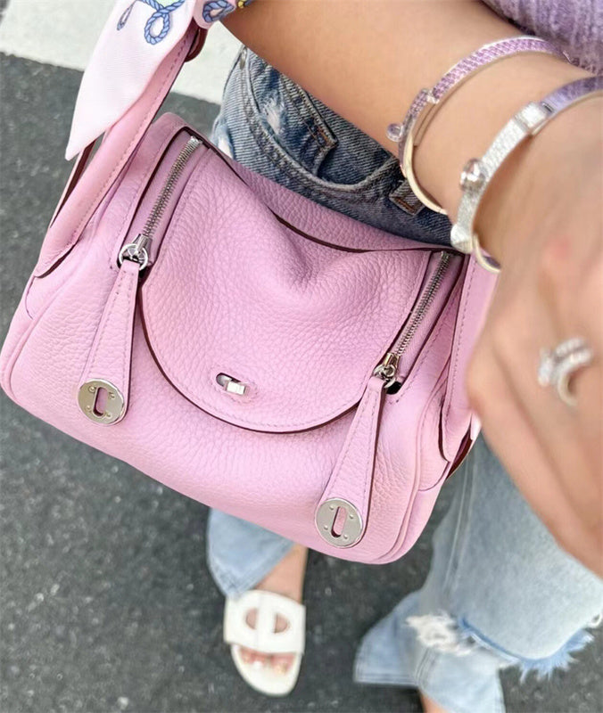 Side view of streamlined structured handbag