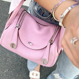 Side view of streamlined structured handbag