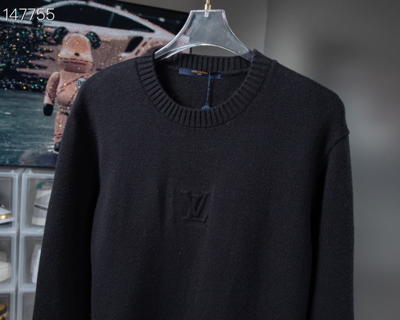 Front view of Louis Vuitton luxury clothing with signature branding