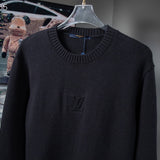Front view of Louis Vuitton luxury clothing with signature branding