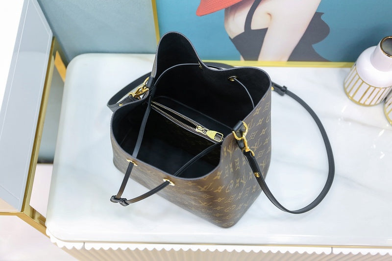 Side profile of classic refined women's handbag – women's statement bag