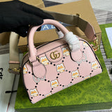 Handle and strap detail of classic statement women's handbag – women's luxury handbag