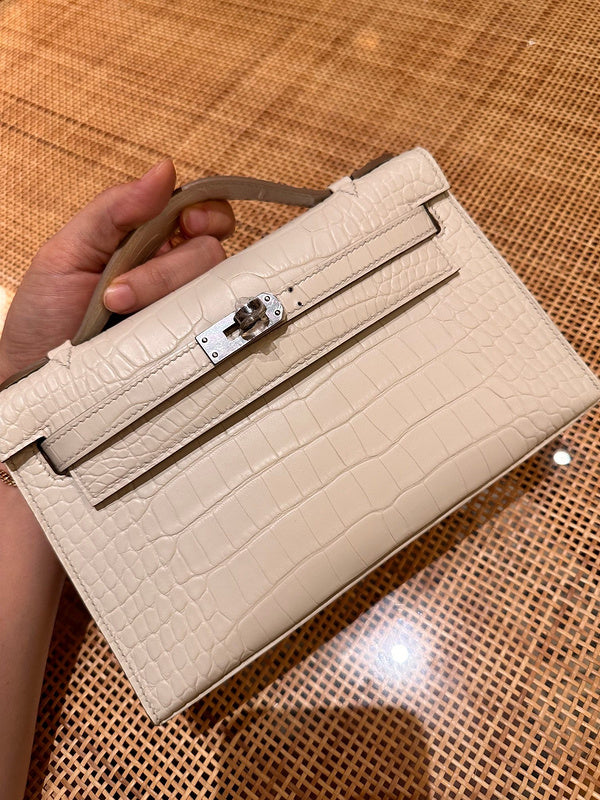  clean-lined crossbody bag styled with outfit