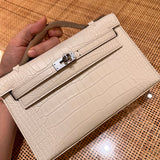 clean-lined crossbody bag styled with outfit