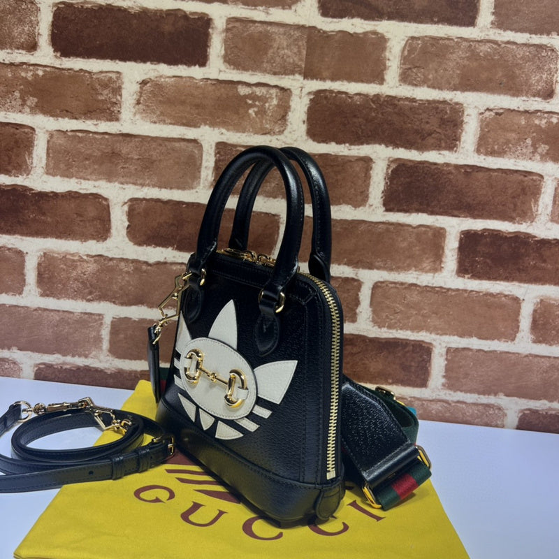 Front view of classic structured women's handbag – women's statement bag