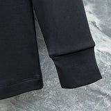 Front view of Louis Vuitton luxury clothing with everyday silhouette