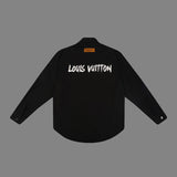 Close-up detail shot of Louis Vuitton luxury clothing with monogram-inspired silhouette