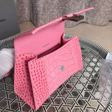 Top view of statement polished women's handbag – women's statement bag