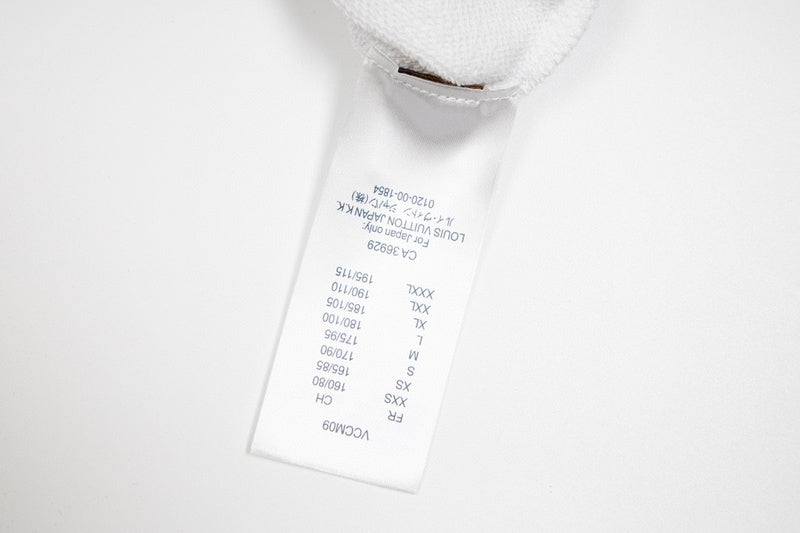 Side profile of Louis Vuitton luxury clothing with logo-detail design