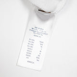 Side profile of Louis Vuitton luxury clothing with logo-detail design