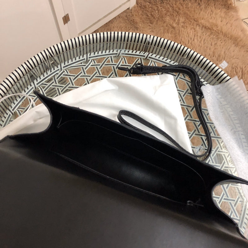 Front view of sleek classic women's handbag – women's everyday handbag