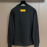 Side profile of Louis Vuitton luxury clothing with tailored silhouette