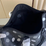  Sleek structured bag carried on shoulder 28