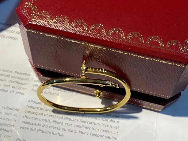 Side view of Cartier unisex jewelry piece