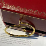 Side view of Cartier unisex jewelry piece